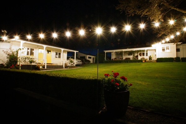 Property grounds - Karapiro Tui Cottage,  1 of 3 in a country garden bordering a native reserve (Maungatautari)
