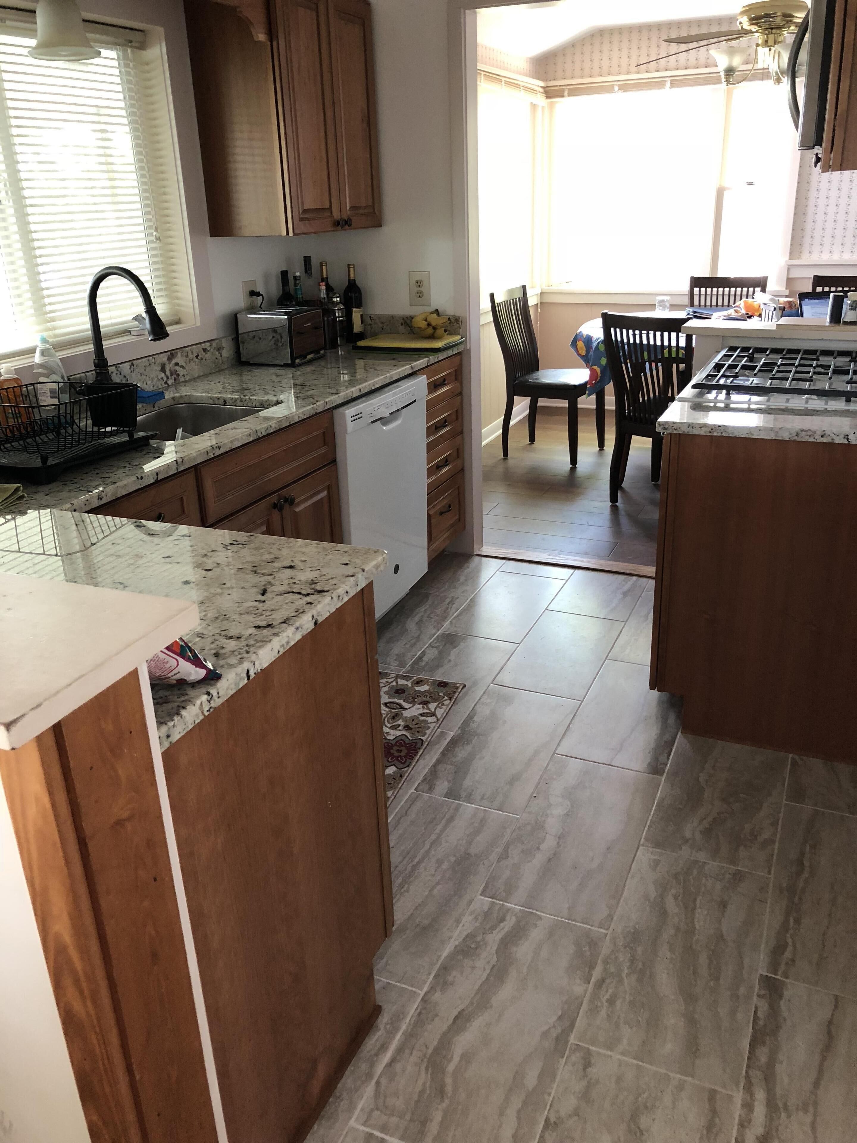 Beach front cottage with private beach and dock, amazing porch with sunset views