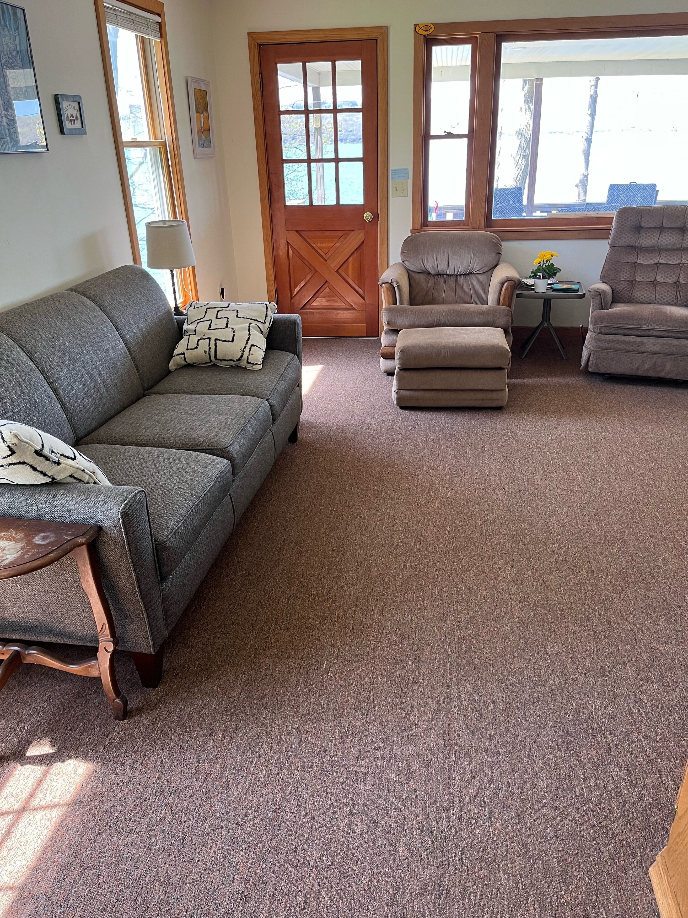 Beach front cottage with private beach and dock, amazing porch with sunset views