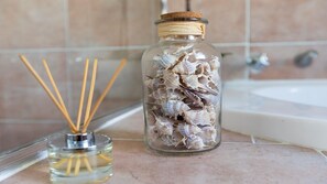 Bathtub, hair dryer, towels