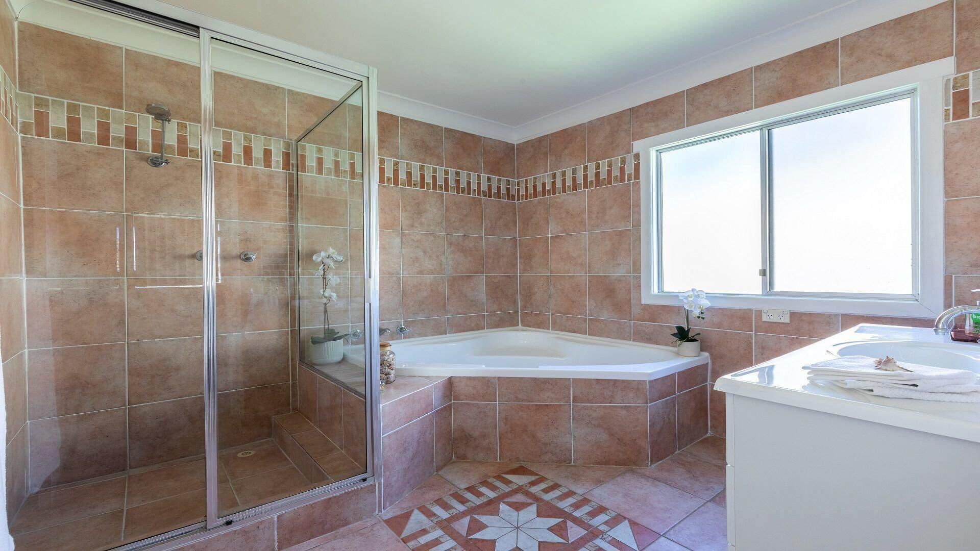 Bathtub, hair dryer, towels