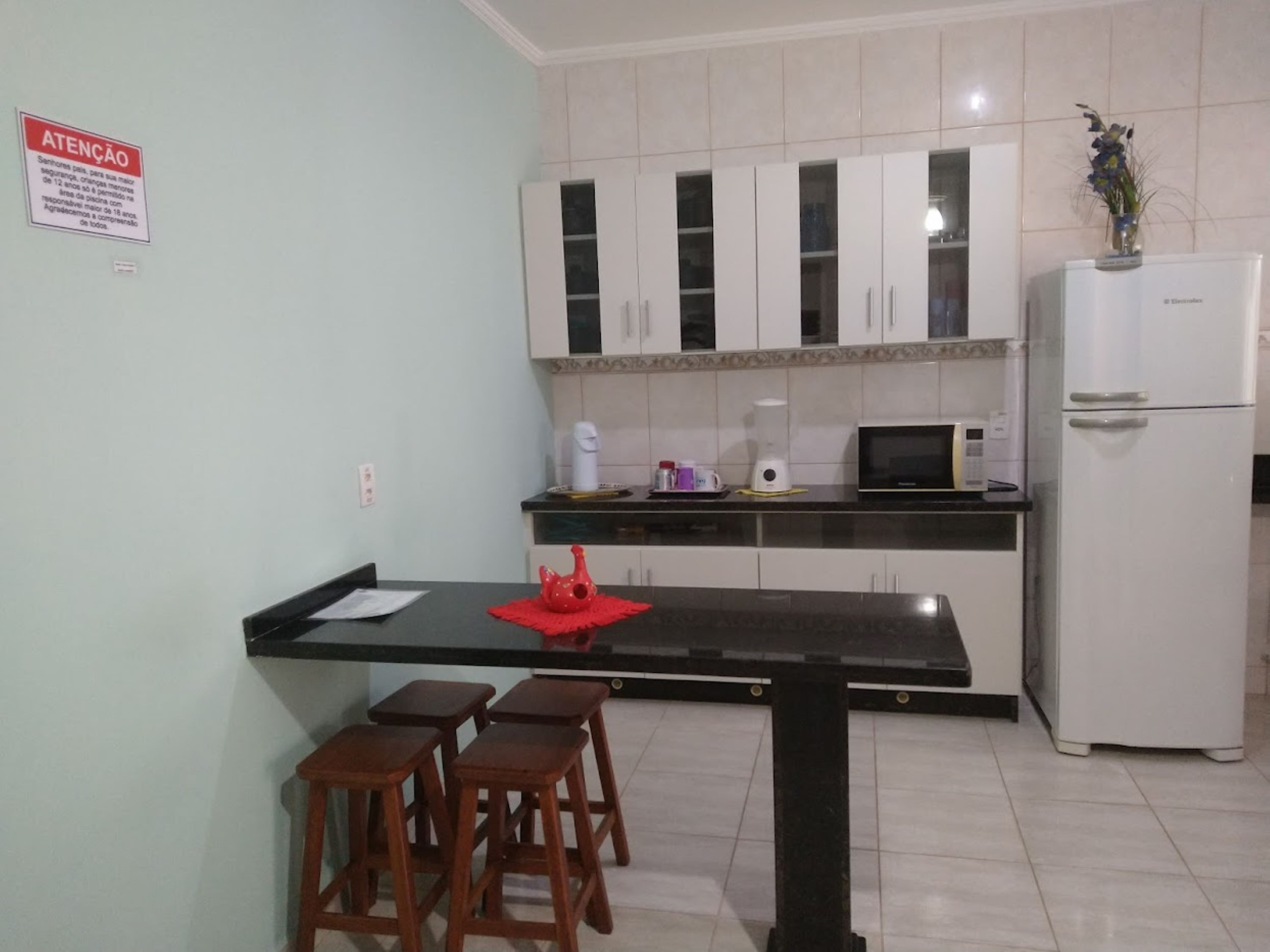 Comfortable home with 1 bedroom, furnished, full kitchen, pool next door.