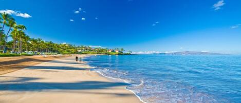 On the beach, sun loungers, beach towels