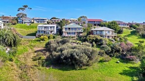 A residential area with houses on a hillside, surrounded by greenery. - Uninterrupted Views Encounter Bay (Encounter Bay)