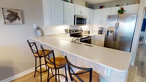 Coffee/tea maker, fridge, microwave, oven - Ocean View Condo w/ Private Balcony, Easy Beach Access (Tybee Island)
