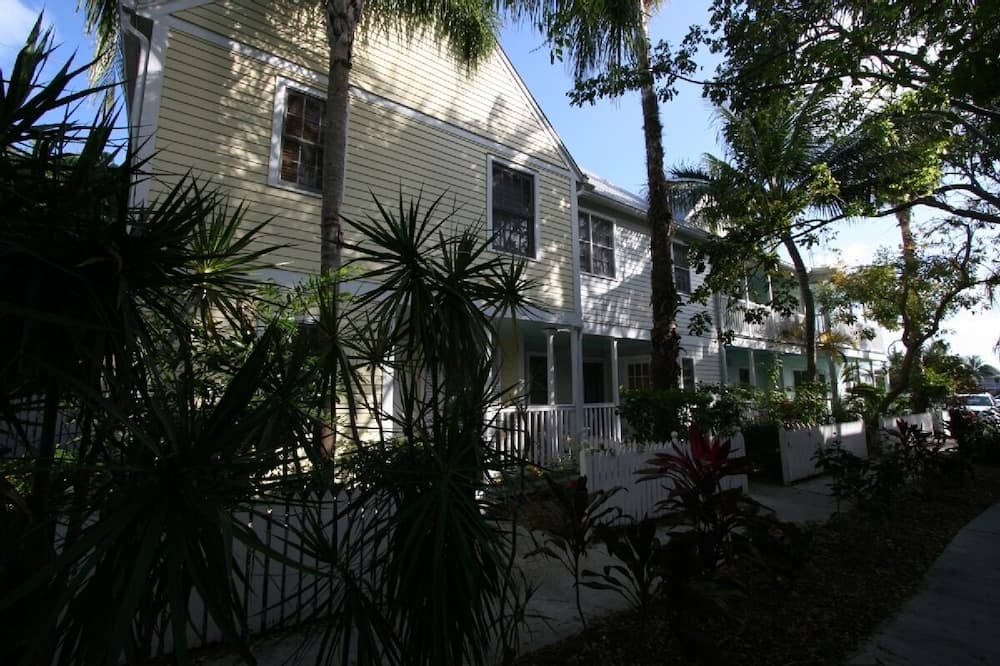 Relax at Villa Nomade in luxurious surroundings. Featuring a fully equipped kitchen with bar seating and dining area. The living room is furnished with comfy furniture and a 50"TV. The bedrooms have queen beds. Enjoy outdoor dining on the deck surrounded by a tropical landscape. <br>Villa Nomade is located in the Shipyard Condominiums at the Truman Annex. The Shipyard is in the heart of Old Town Key West on the former U.S. Navy property of Truman\'s Little White house. Just steps from Duval St. and located near the Ft. Zach beach and Hemingway\'s house, all of Old Key West\'s sites are within easy walking distance. Our private oasis can be your tropical retreat. <br><br>COVID-19 UPDATE after May 1, 2020. Please note our 60 day refund policy. We will no longer offer a cash refund after the 60 day period has passed. We will offer a credit if local authorities issue travel restrictions that prevent your visit to Key West. Villa Nomade at Shipyard Condominiums