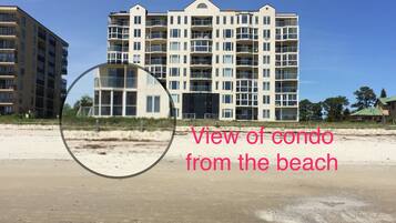 On the beach, sun loungers, beach towels