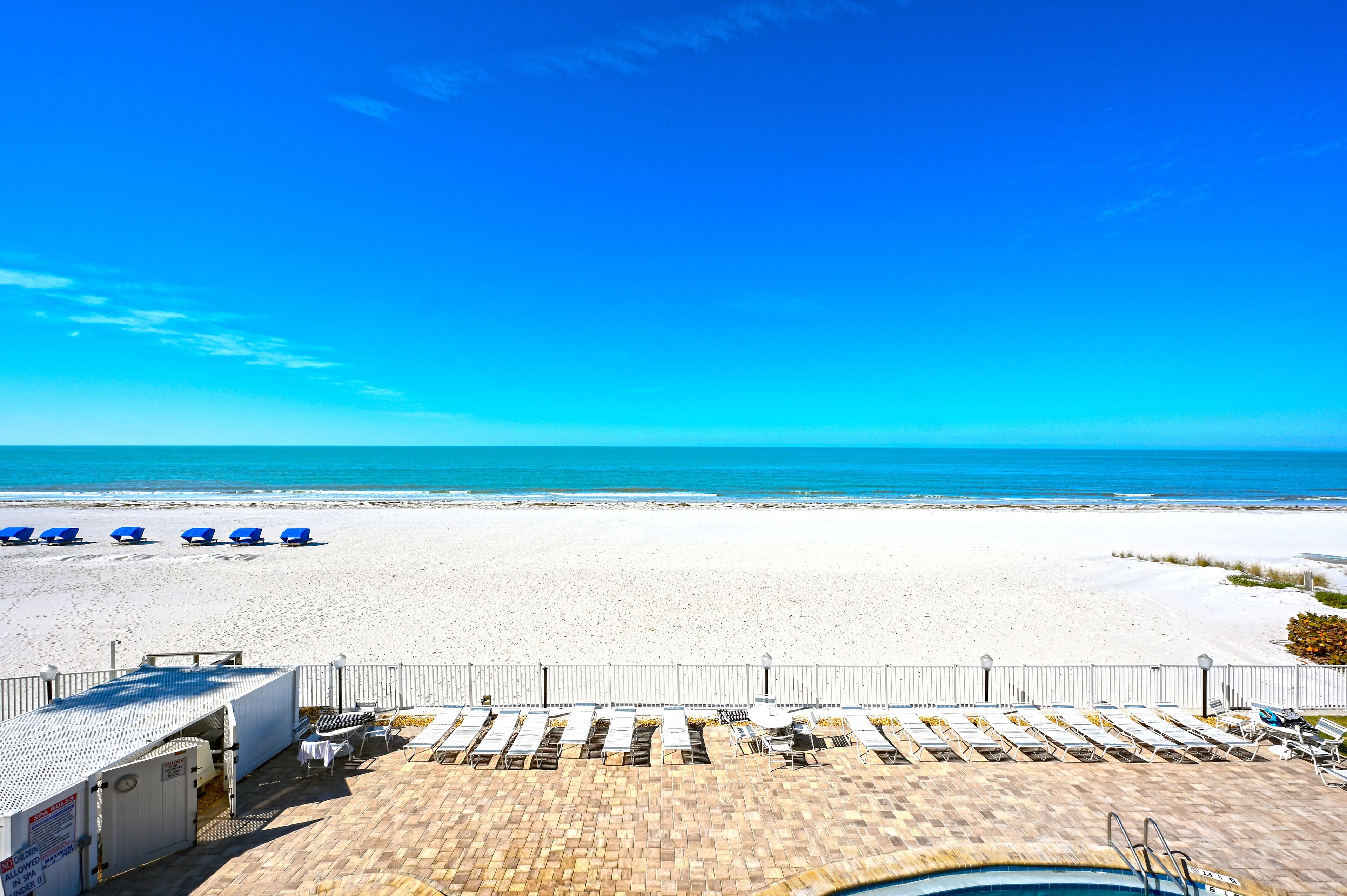 On the beach, sun-loungers, beach towels