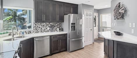 Coffee/tea maker, fridge, microwave, oven