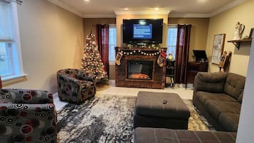 Smart TV, fireplace, table tennis, books