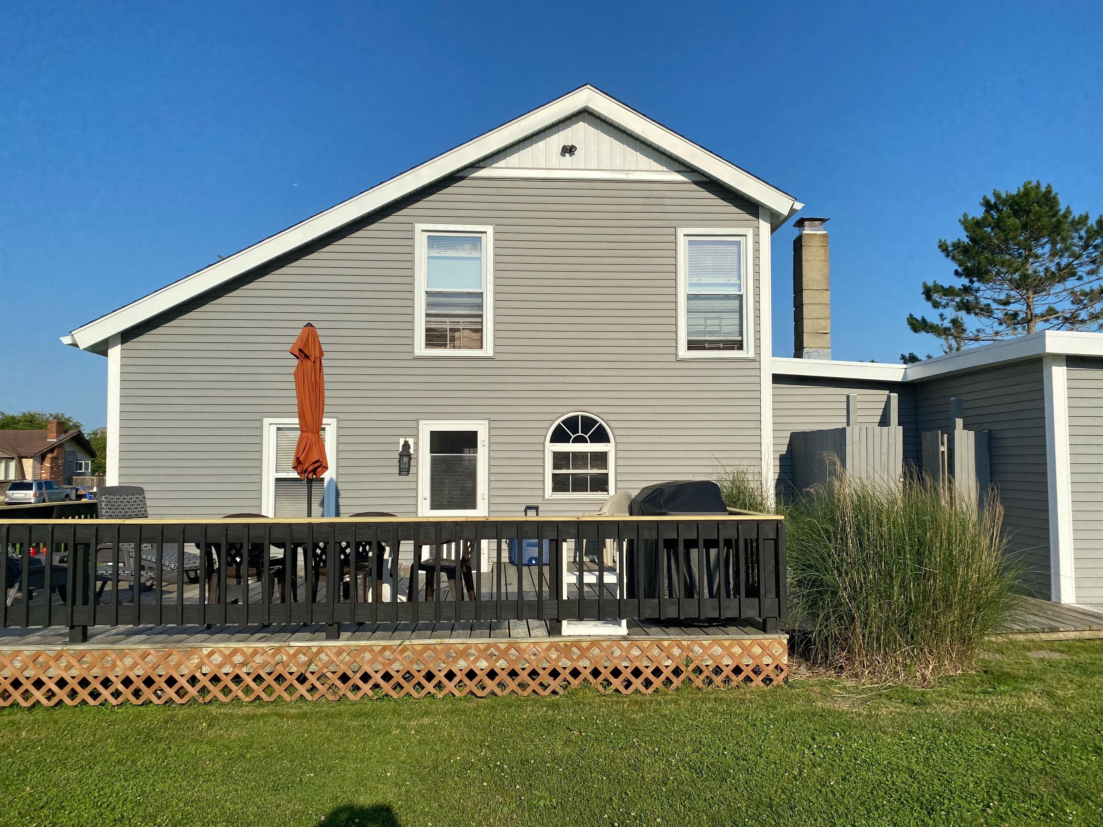 Eastward Look-North! A/C, walk to beach, open&airy, flat yard