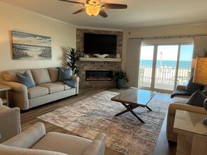 Smart TV, fireplace, books