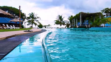 3 outdoor pools, open 7:00 AM to 10:00 PM, pool umbrellas, pool loungers