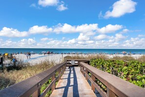 On the beach, sun loungers, beach umbrellas, beach towels