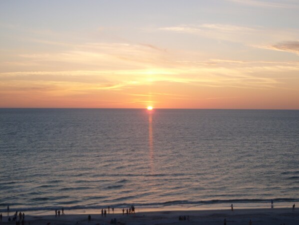 On the beach, sun-loungers, beach umbrellas, beach towels