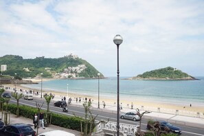 On the beach, sun-loungers, beach towels