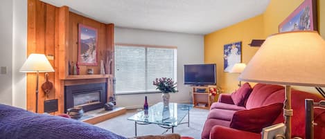 Flat-screen TV, fireplace