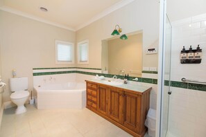 Bathtub, hair dryer, towels