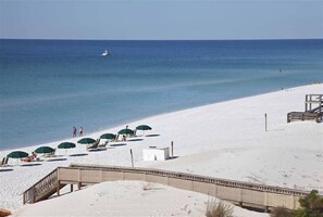 On the beach, sun loungers, beach umbrellas