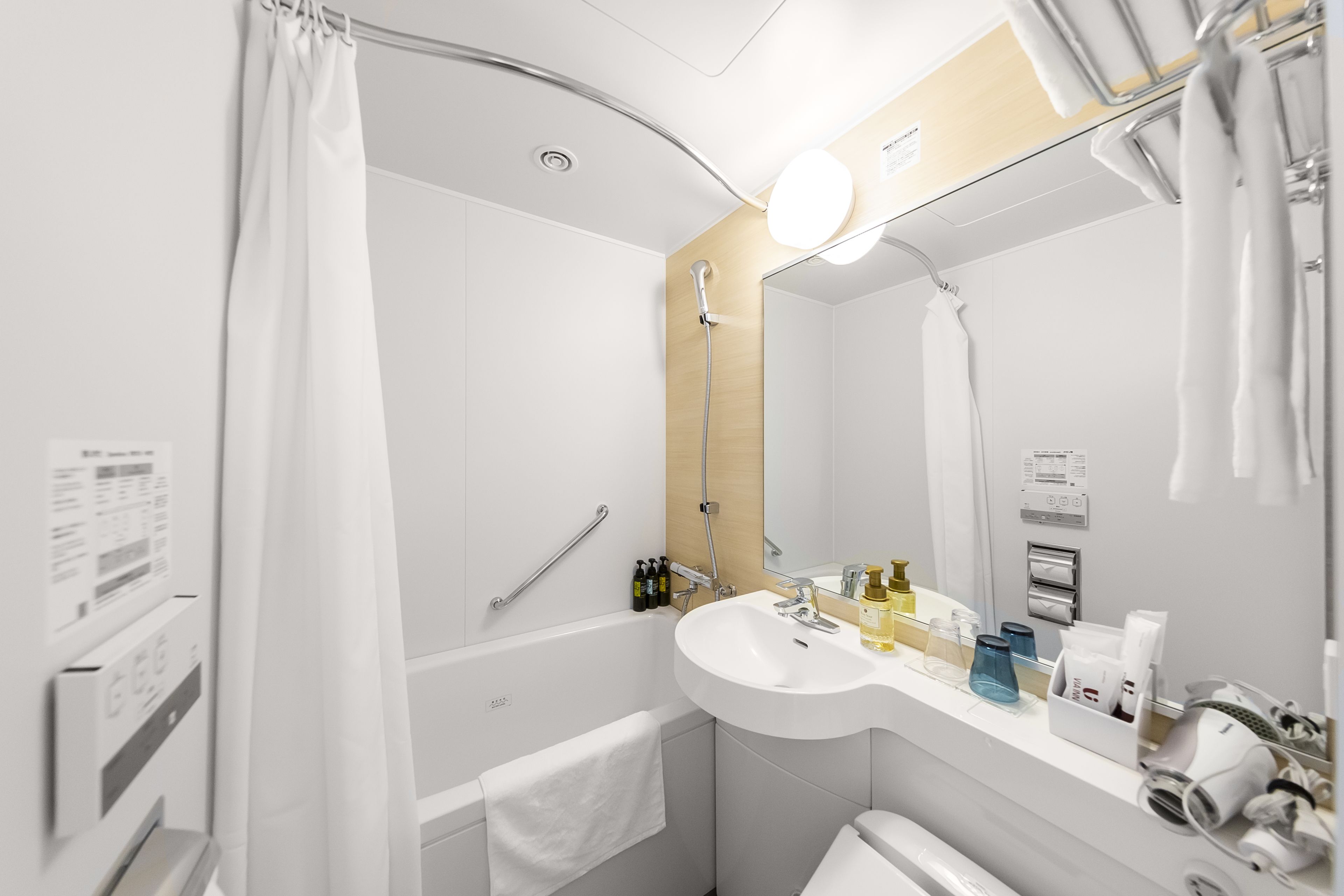 free toiletries, hair dryer, slippers, towels