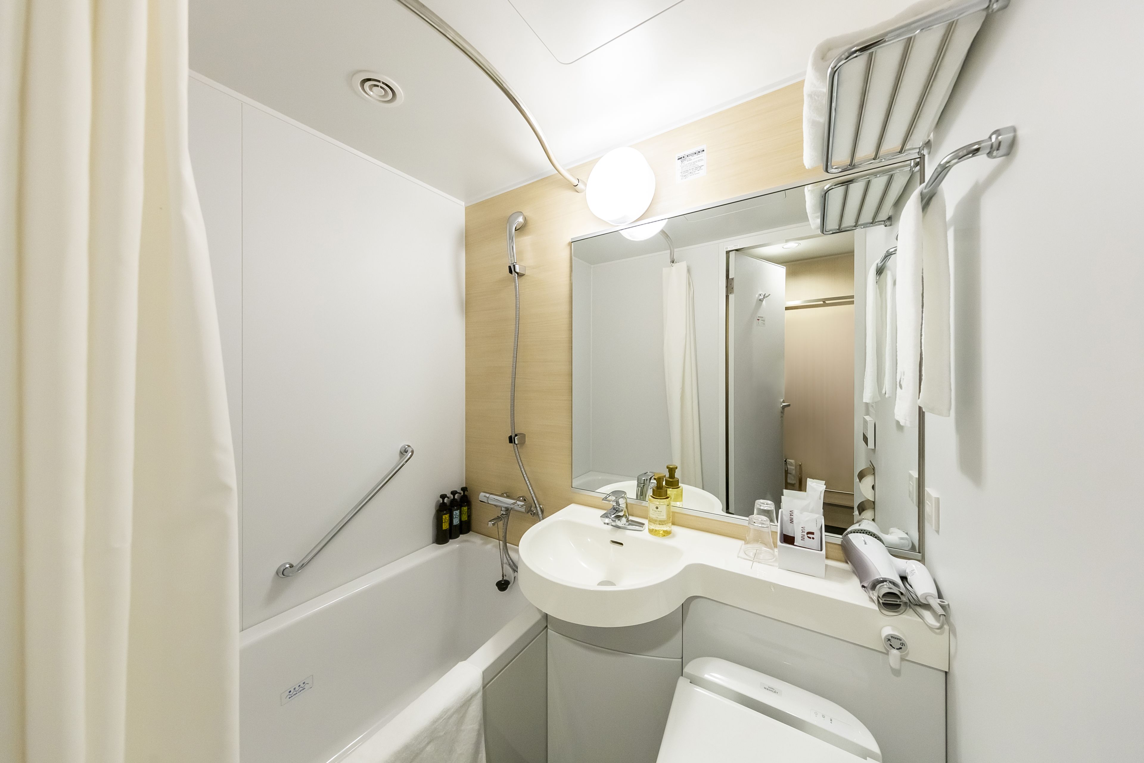 free toiletries, hair dryer, slippers, towels