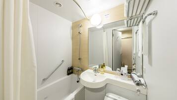 Eco-friendly toiletries, hair dryer, slippers, bidet