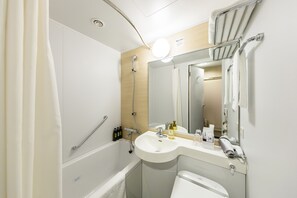 Eco-friendly toiletries, hair dryer, slippers, bidet