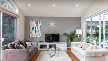 TV, DVD player, books, video library