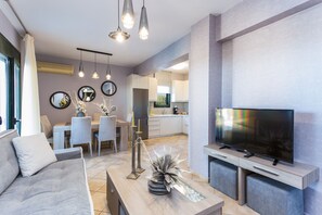 Flat-screen TV, fireplace, video-game console, DVD player