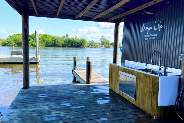 First class fish cleaning station or BBQ prep with lights and electric outlet.