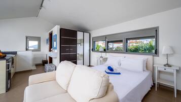 1 chambre, coffres-forts dans les chambres, fer et planche à repasser