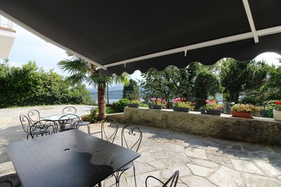 Overlooking Lake Orta. Plenty of room, private garden with pool