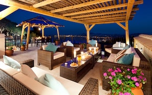 Outdoor dining - Villa Petalutha - A Stunning Villa with panoramic sea and mountain views.  (Corfu)