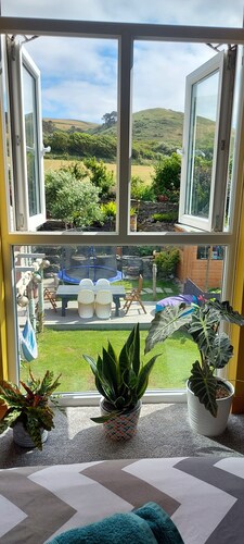 fantastic family home- central village location & short level walk to beach