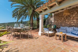 Outdoor dining - A stunning newly renovated town house with superb views. (Biniaraix)