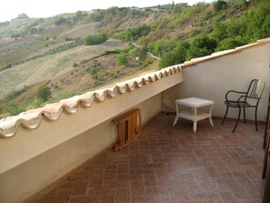 Terrace/patio - Edge of Nature Reserve; a/c   5* views. Great peace & privacy. Mountains & Sea. (ATRI)