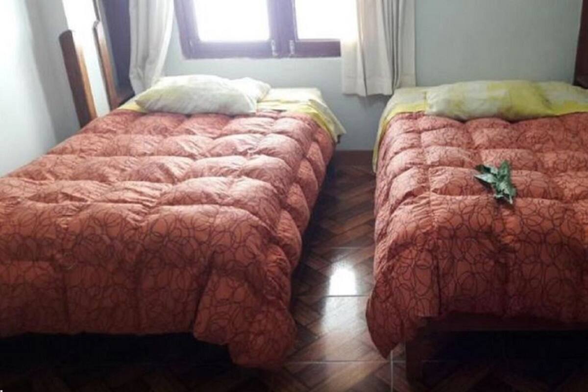 Twin Room, 2 Twin Beds, Private Bathroom | In-room safe, WiFi (free), bed sheets