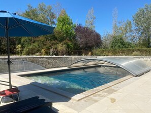 Alberca techada y alberca climatizada