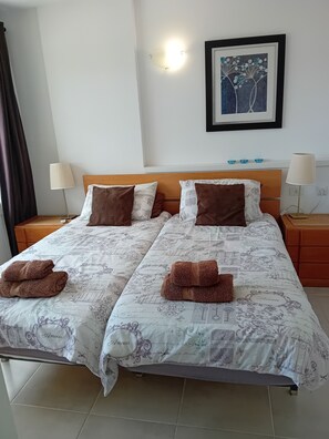 1 dormitorio, tabla de planchar con plancha, wifi gratis y ropa de cama