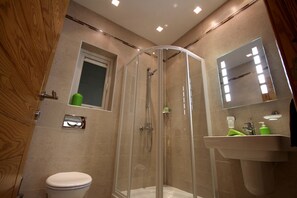 Bathtub, hair dryer, towels, soap