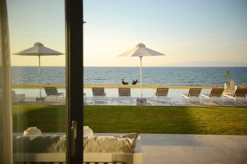 An Impressive Beachfront Luxury Retreat with Private Beach