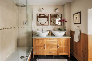 Bathtub, hair dryer, towels, soap