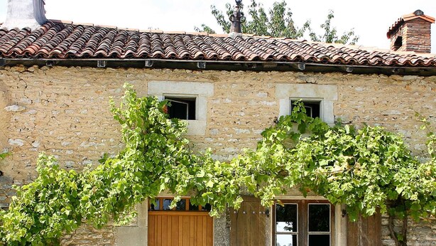 A rustic stone building with a wooden door, two windows, and a tiled roof. - Charming, Detached Farmhouse With Private Swimming Pool. (Lizant)