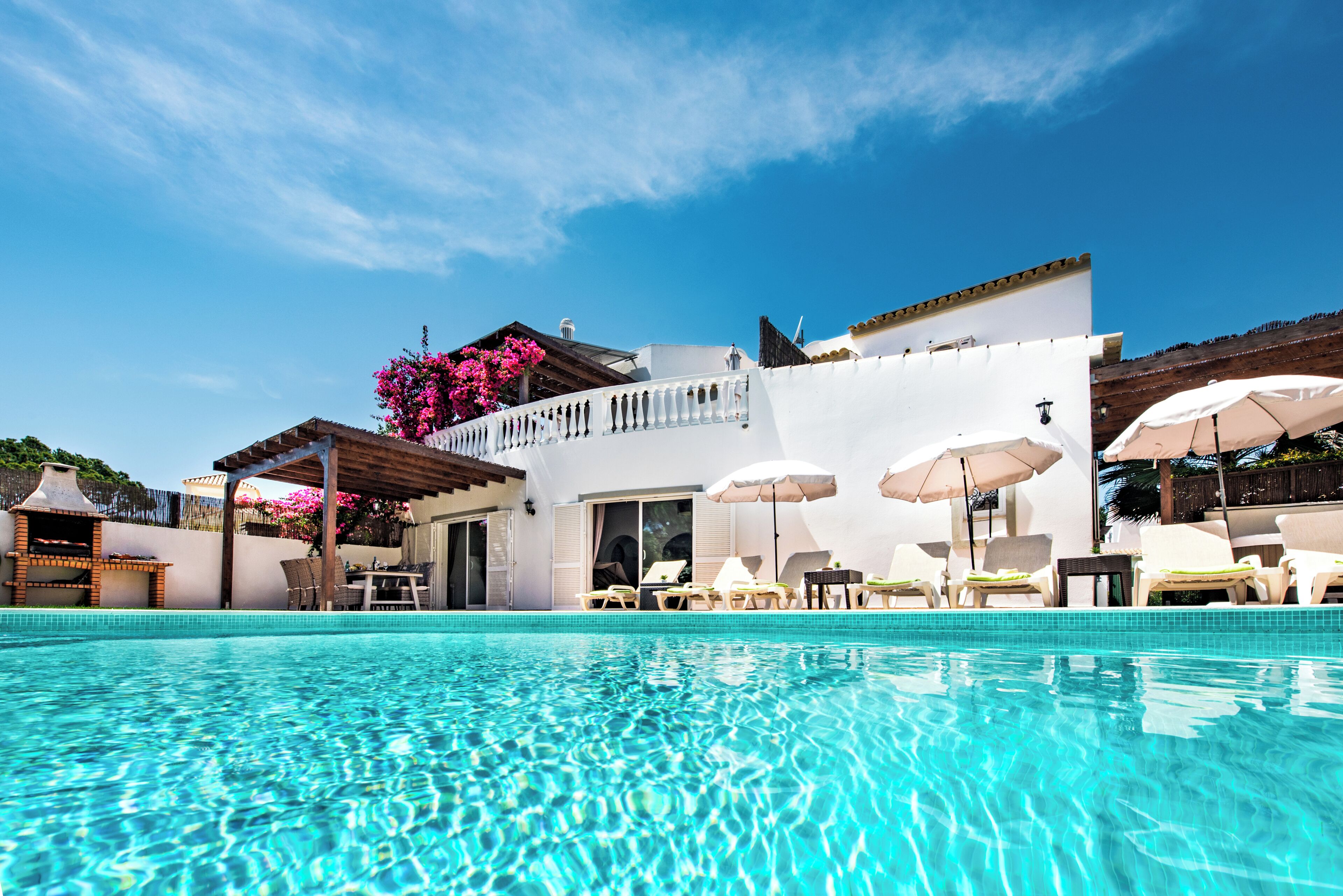 Outdoor pool, a heated pool, sun loungers