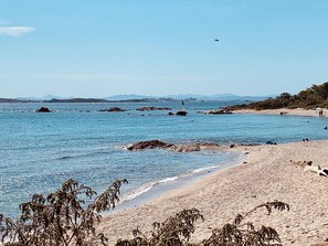 On the beach, sun-loungers, beach towels