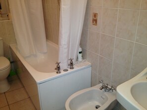 Hair dryer, towels, soap, shampoo