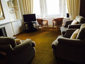 TV, DVD player, books, video library
