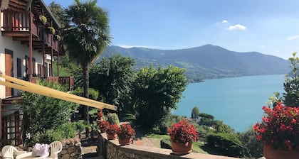 Two-room apartment in Residence with swimming pool and panoramic lake view in Sale Marasino