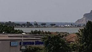 A coastal building with a sign reading "Centro Nucleo". - Sea view Penthouse sea view (Quartu Sant'Elena)
