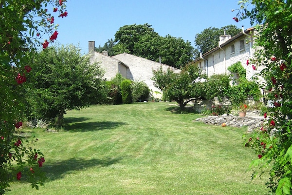Shared garden at family friendly Les Hiboux gites
